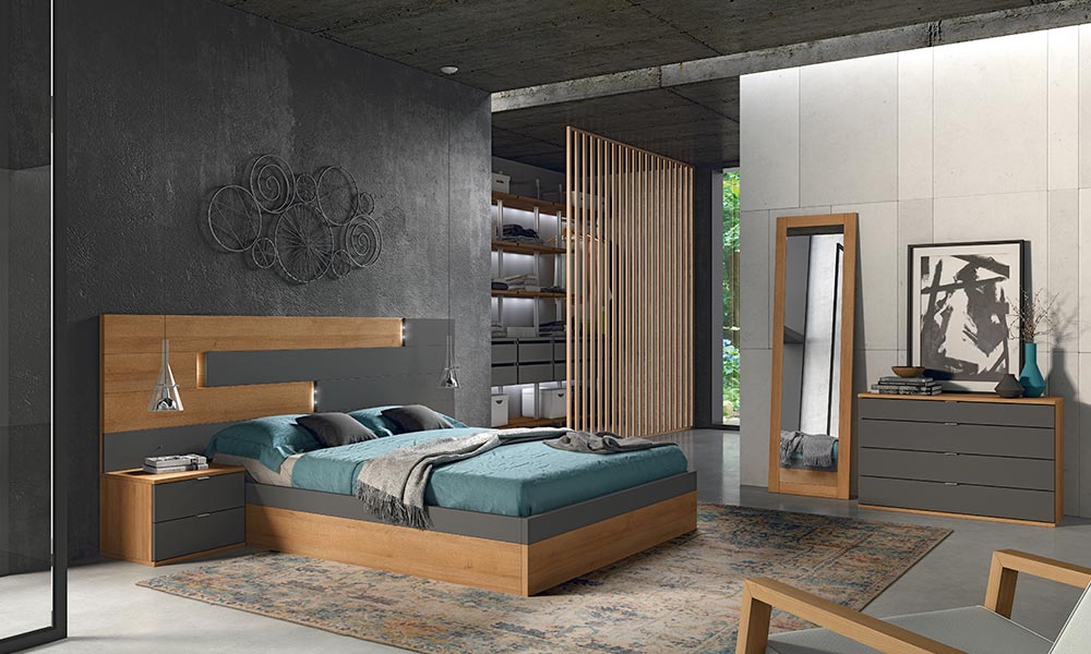 ¿Has probado a combinar un cabecero irregular con luces led en combinación con tu canapé de madera y color negro? Te encantará el resultado dormitorio moderno