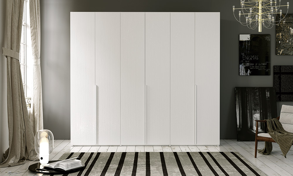 El armario CLAUDIA, con 5 o 6 puertas batientes, es ideal para habitaciones de grandes dimensiones, pues sus 5 barras y 3 estanterías permiten guardar una gran cantidad de prendas en su interior ideas dormitorio